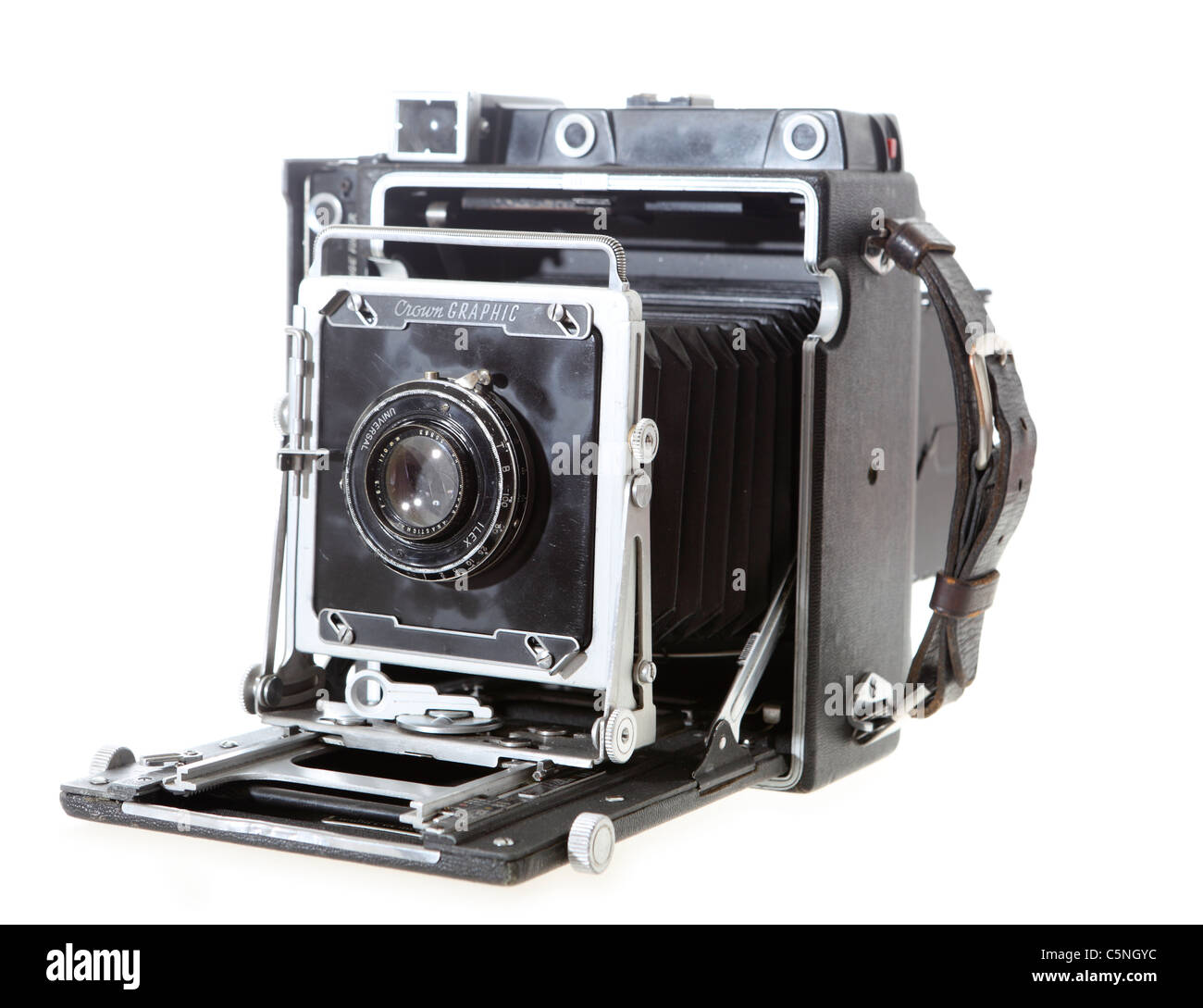 A 4x5 Crown Graphic American press camera probably c.1958 with a 1930s Kodak lens in an Ilex shutter, isolated on white. Stock Photo
