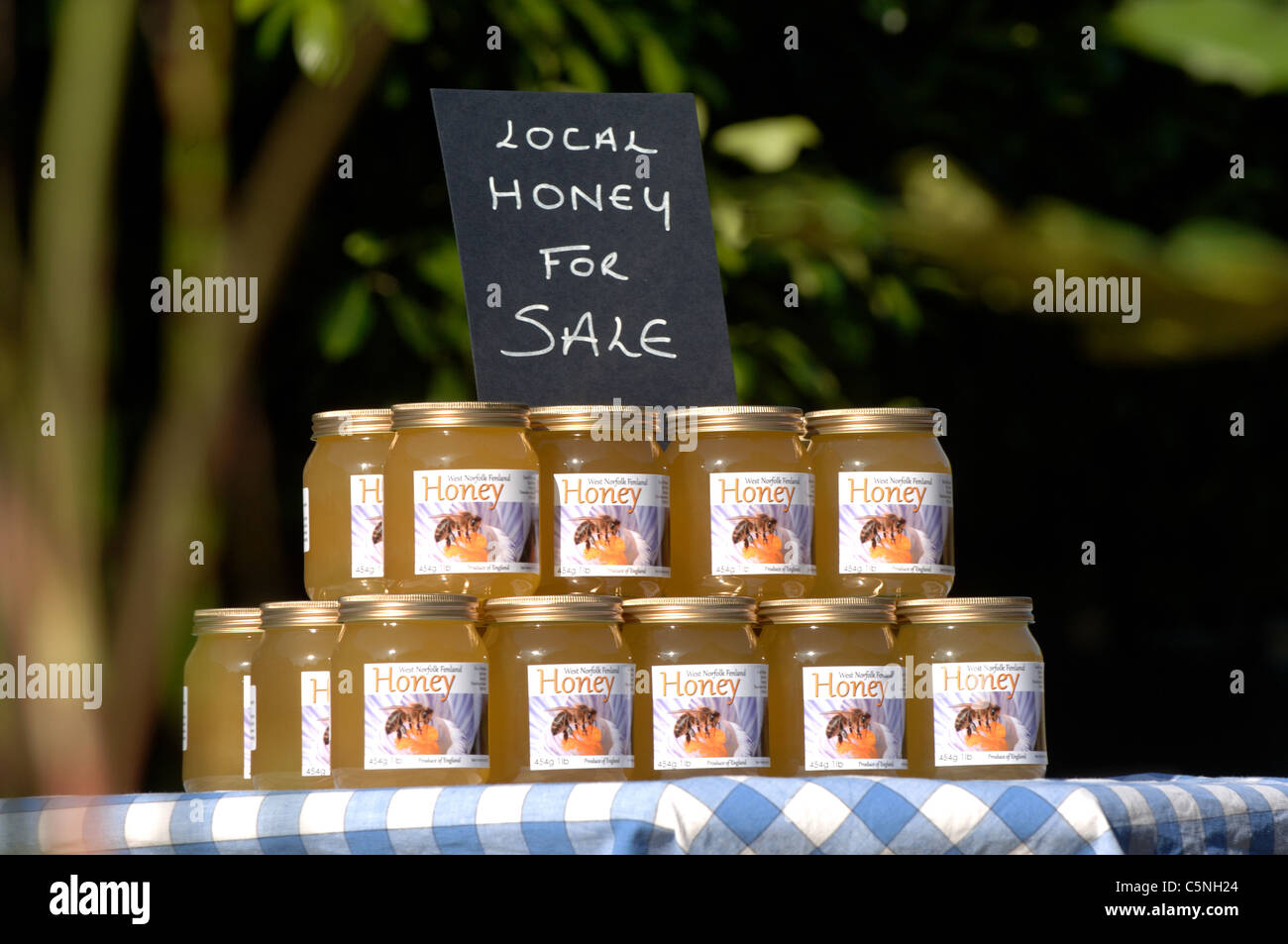 Jars of liquid honey for sale Stock Photo Alamy