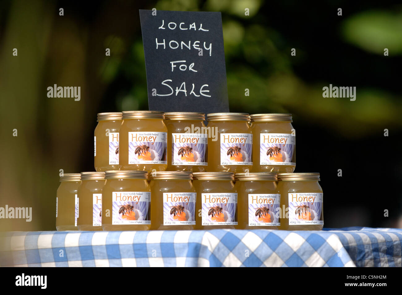 Jars of liquid honey for sale Stock Photo Alamy