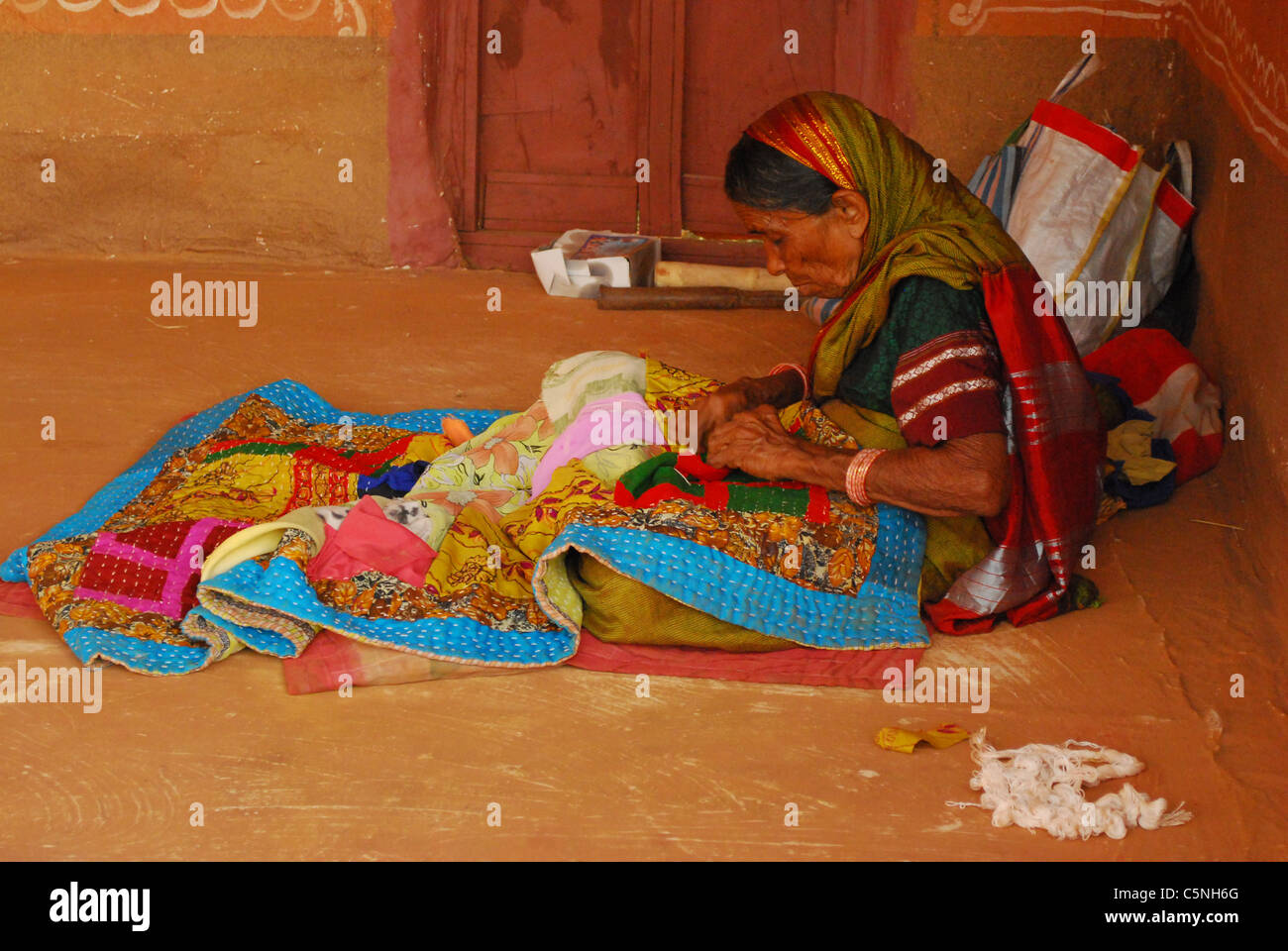 Woman sewing a blanket hi-res stock photography and images - Alamy