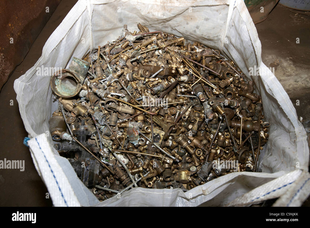 Brass ready for recycling in a scrapyard, uk Stock Photo Alamy
