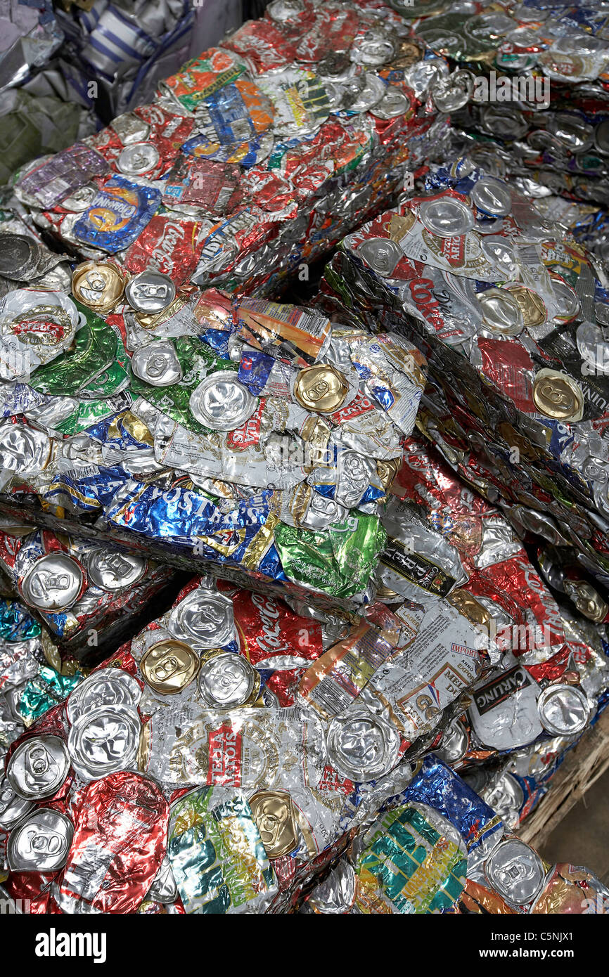 Crushed aluminium cans ready for recycling in a scrapyard, uk Stock