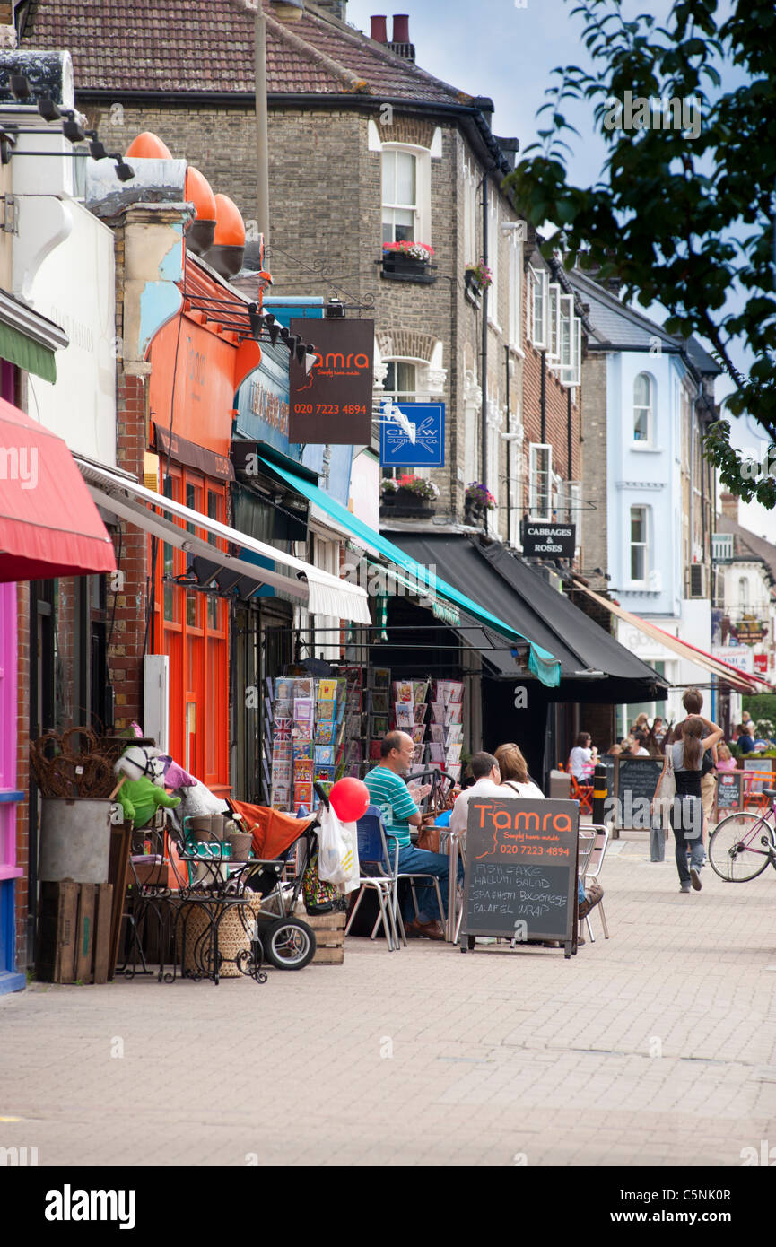 Local shops, cafes and restaurants on Northcote Road (the B229) in Wandsworth, London, England, UK. Stock Photo