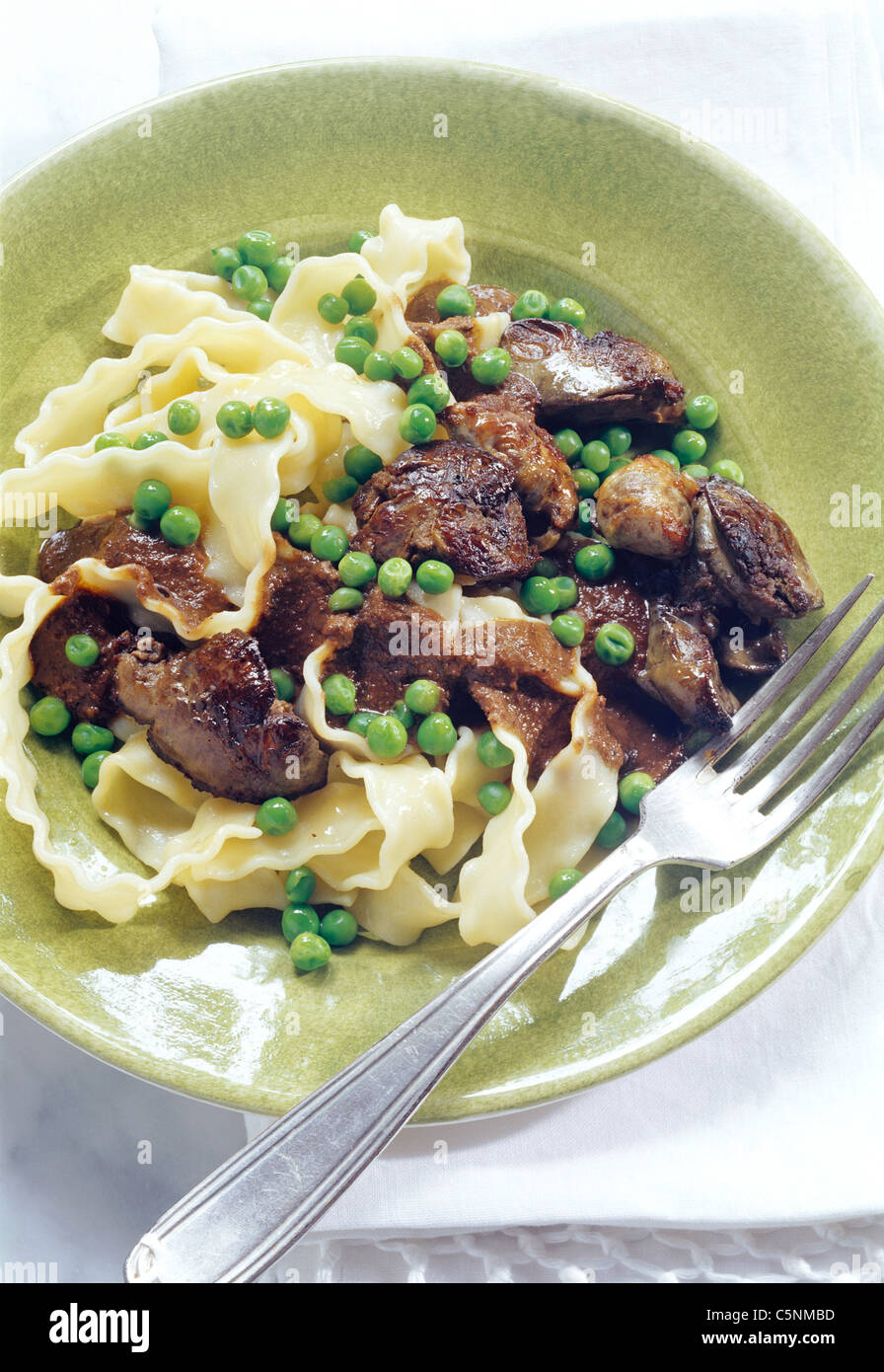 Pappardelle pasta with chicken liver and peas Stock Photo Alamy