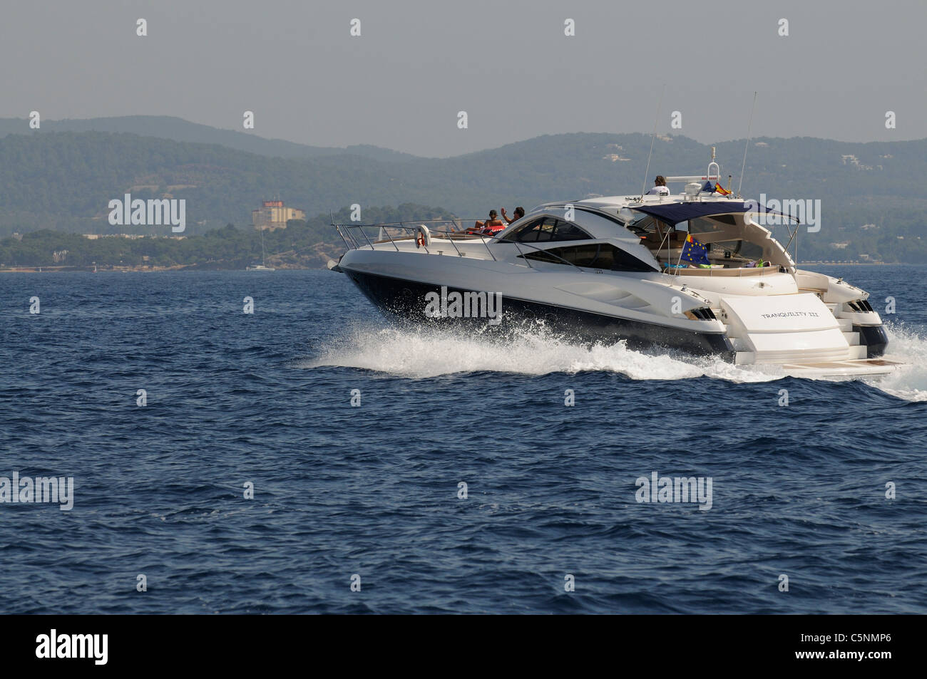 Luxury motoryacht off the coast of Ibiza a Spanish Island in the Mediterranean Sea Stock Photo