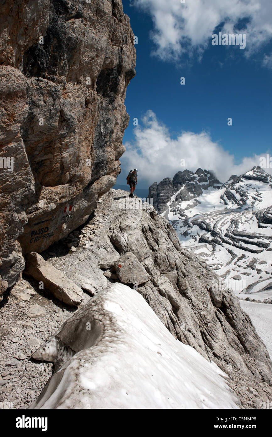 Climber on the Via Ferrata route Sentiero Alfredo Benini in the Brenta ...