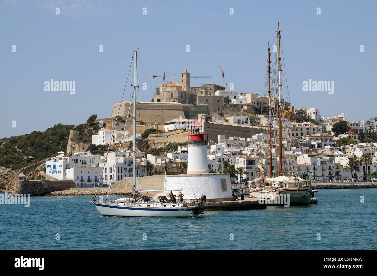 Harbour entrance at Eivissa Ibiza a Spanish Island in the Mediterranean Sea overlooked by the old town & Cathedral Stock Photo
