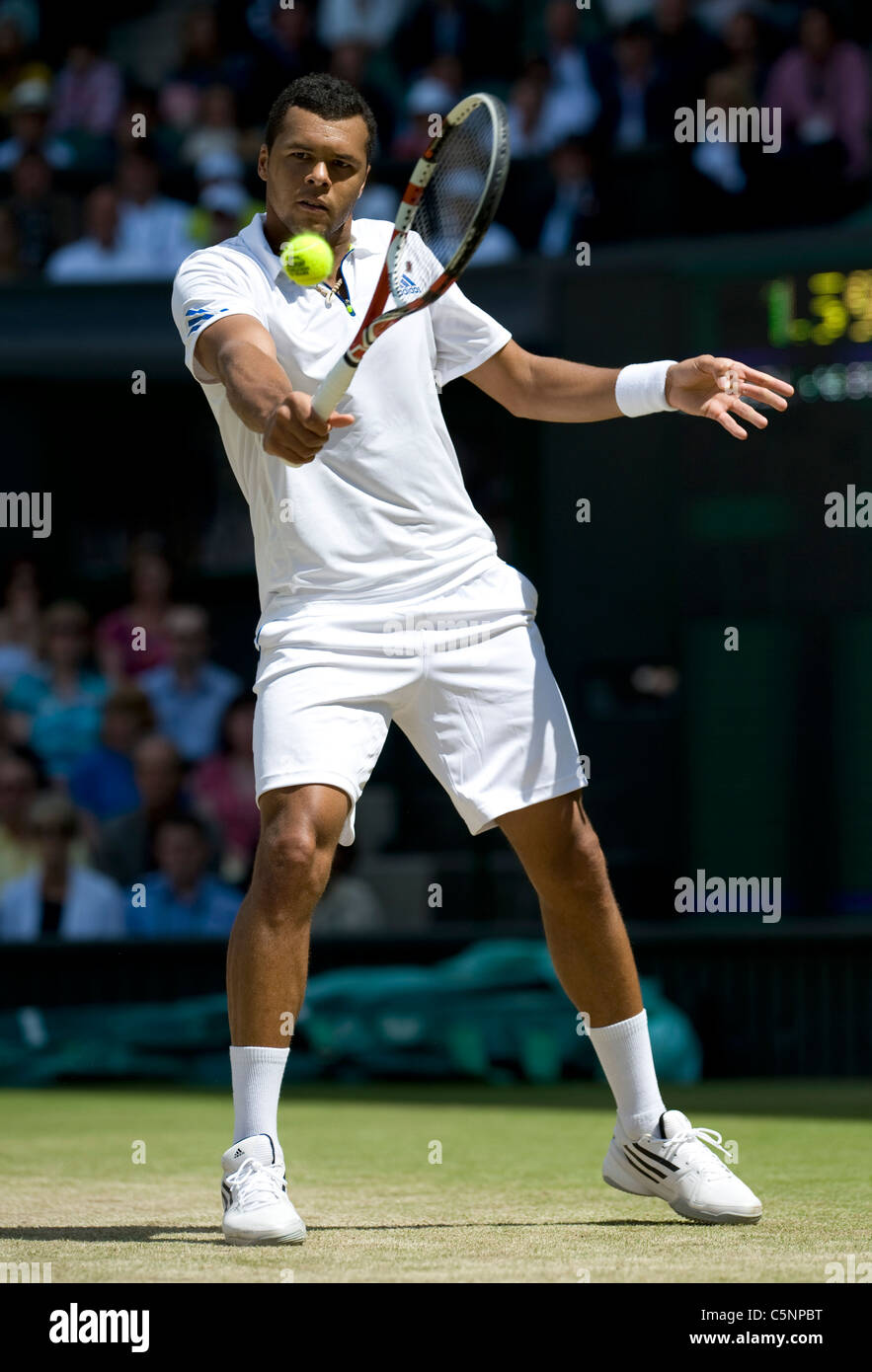 Jo-Wilfried Tsonga (FRA) in action during the Wimbledon Tennis  Championships 2011 Stock Photo - Alamy