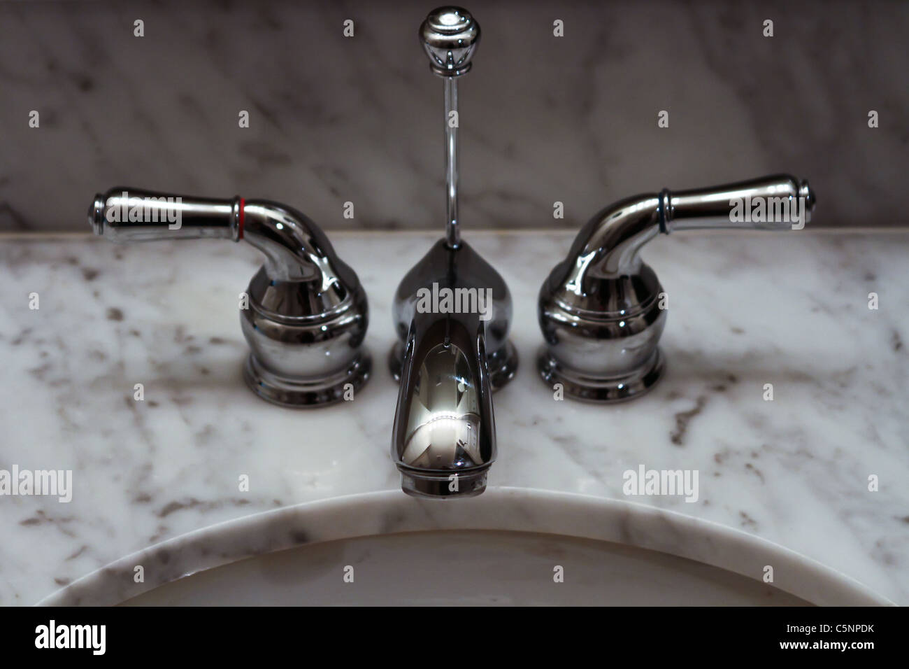 stainless steel facet marble sink Stock Photo