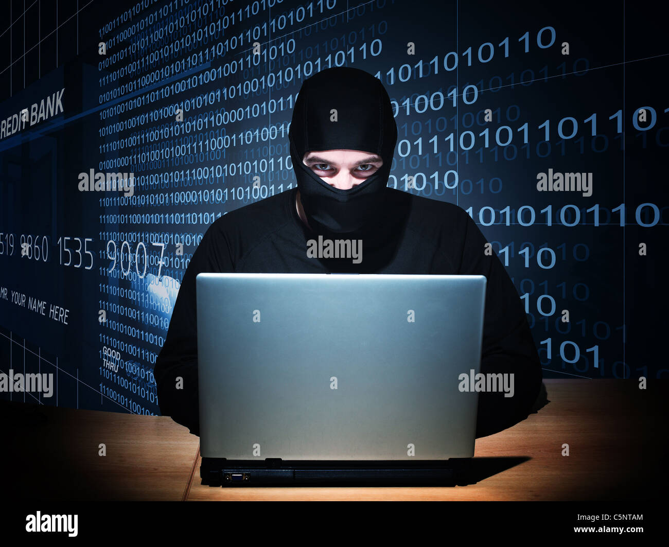 portrait of caucasian hacker with balaclava Stock Photo