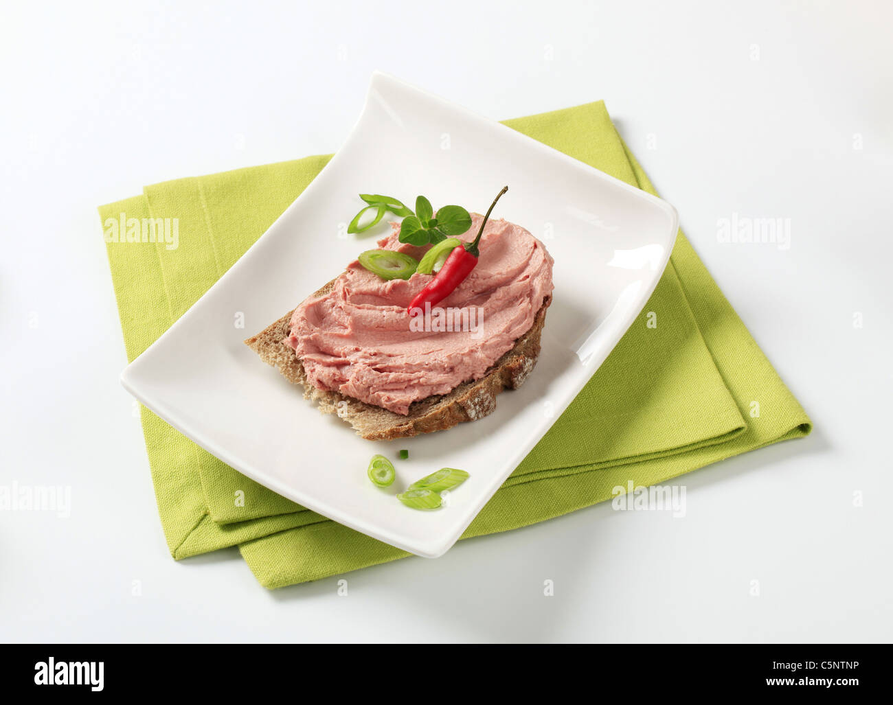 Slice of bread and smooth liver pate Stock Photo