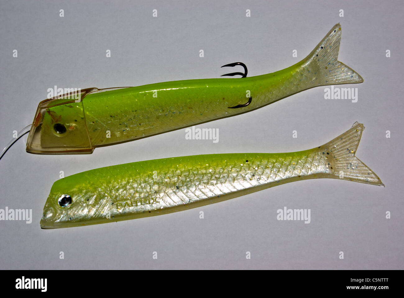 Soft silicone plastic imitation herring strip baits teaser head holder lure Stock Photo