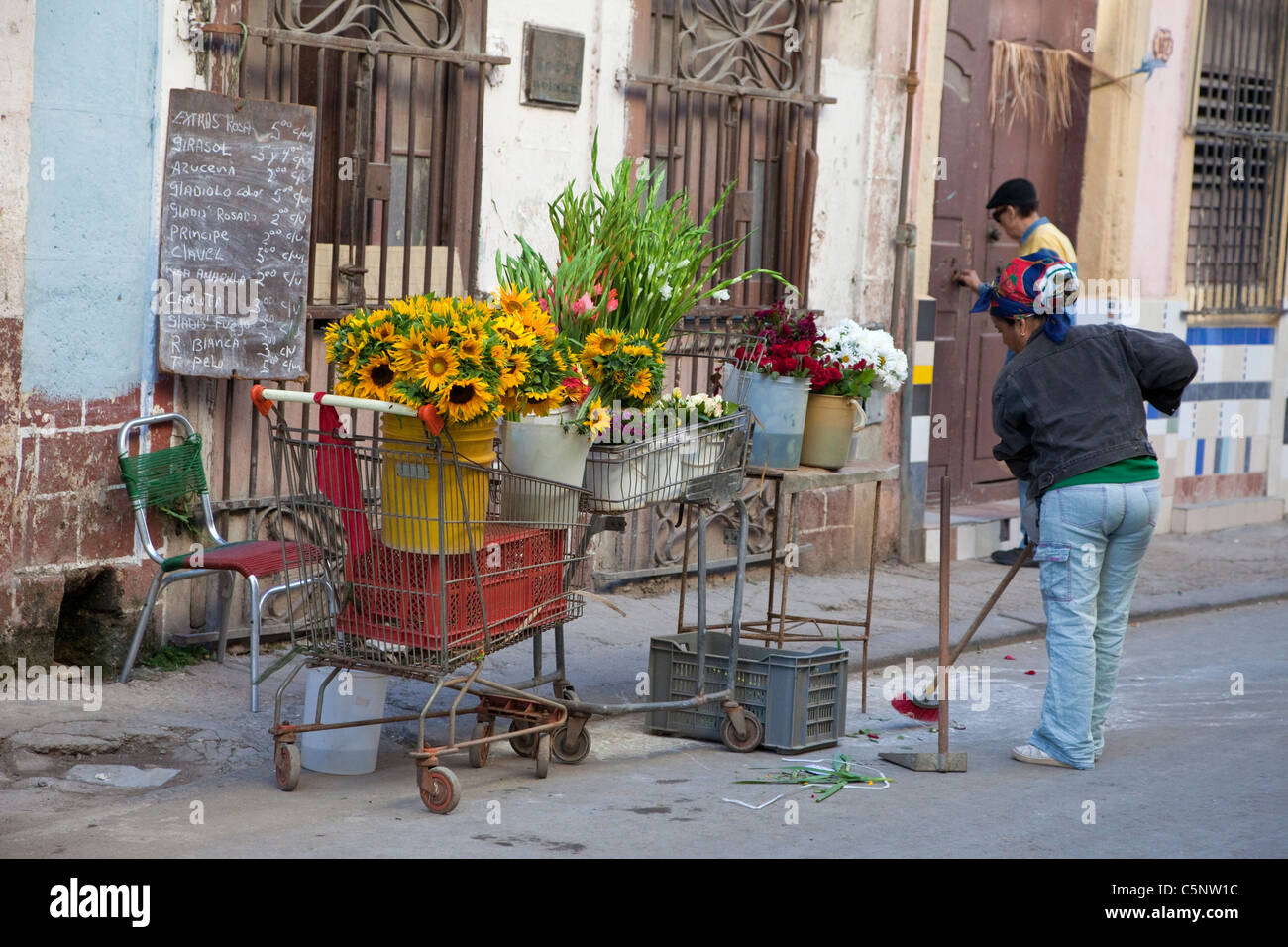 Cuba, Havana. Flower Vendor on a Street in China Town. Stock Photo