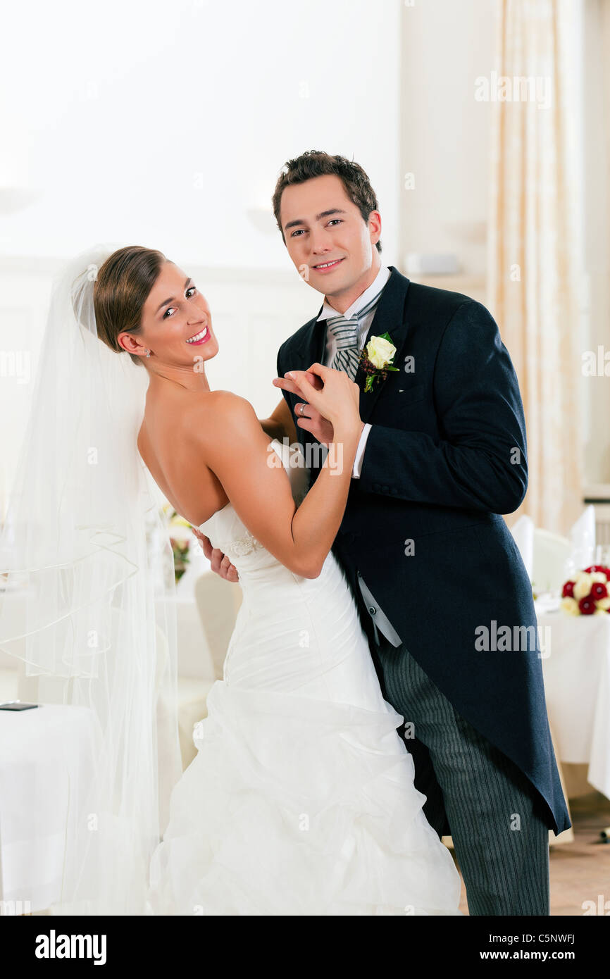 Bride and groom dancing the first dance at their wedding day Stock
