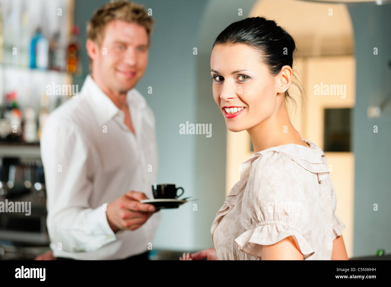 Client in cafe hi-res stock photography and images - Alamy