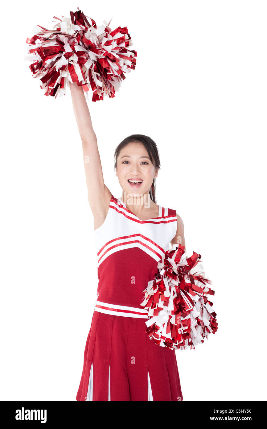 Cheerleader in action with her pompoms Stock Photo Alamy