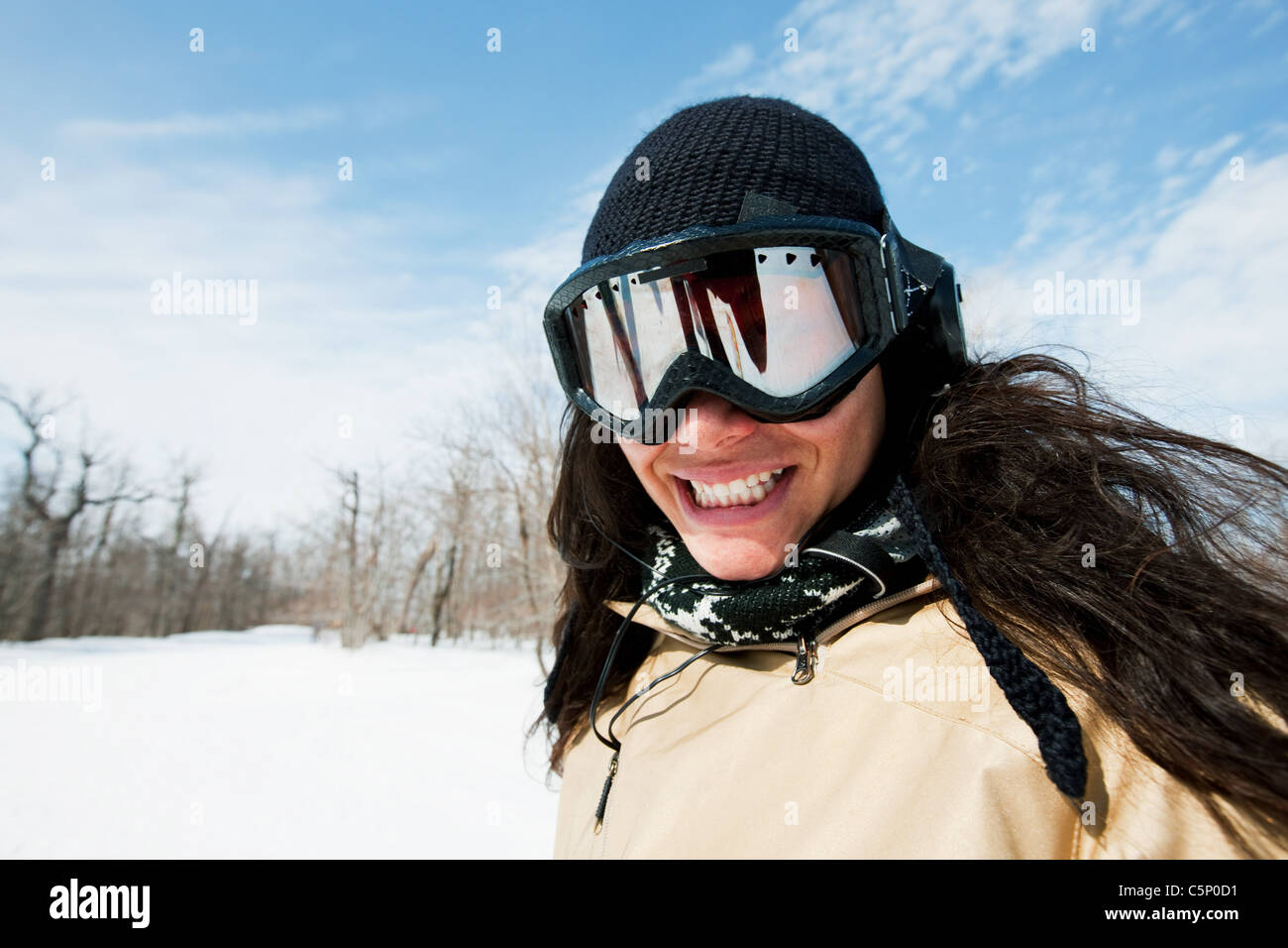 Woman wearing ski goggles, portrait Stock Photo Alamy