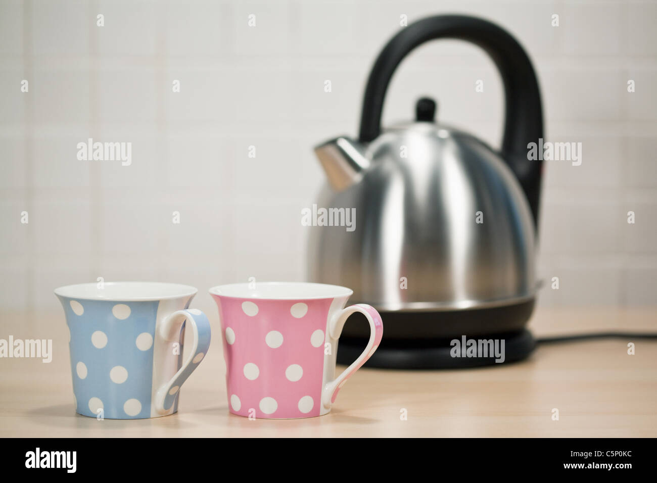 Luxury silver vintage tea kettle isolated on white Stock Photo by