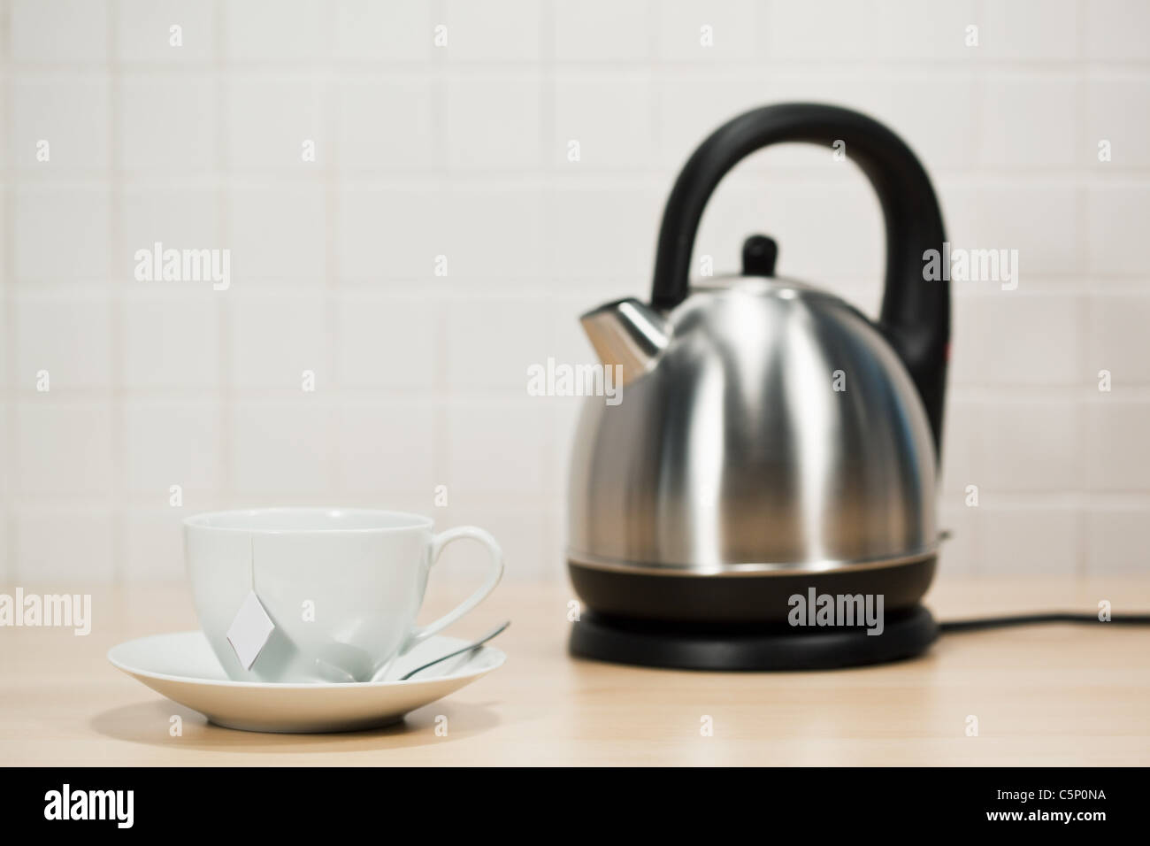 Teacup and kettle Stock Photo Alamy