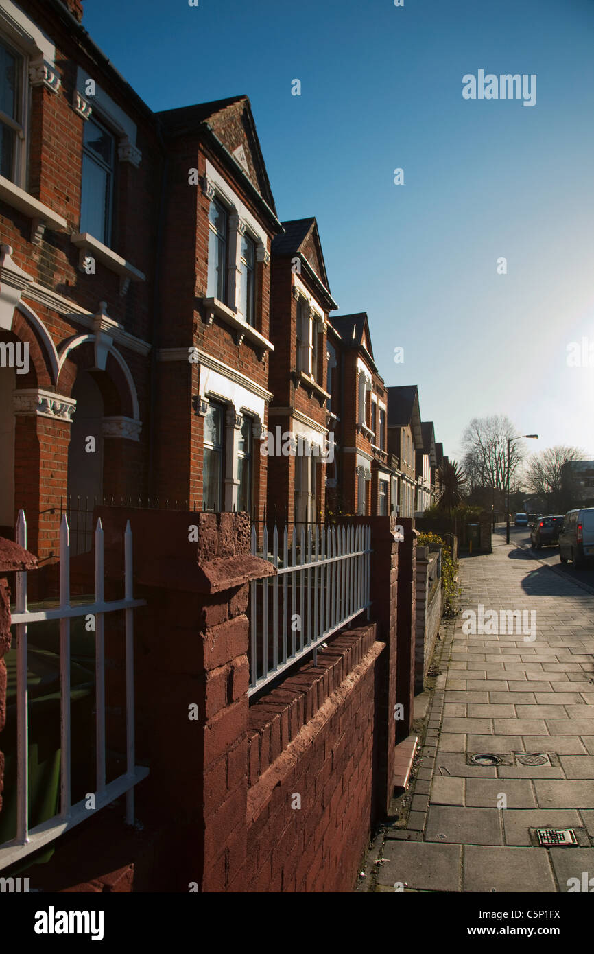 House exteriors against blue sky Stock Photo - Alamy