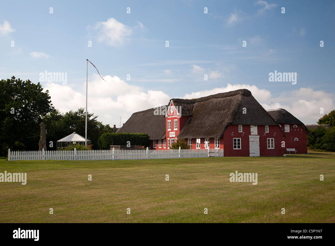 Typical red painted farm on the Danish Wadden island Romo, Jutland, Denmark Stock Photo Alamy