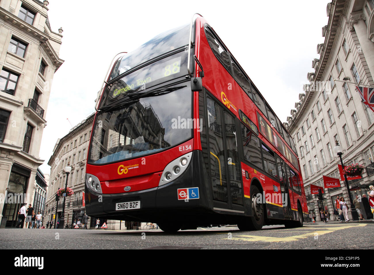 A red London bus on Regent Street, London, England, U.K. Stock Photo