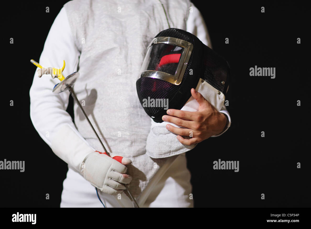 Fencing mask and Foil Stock Photo