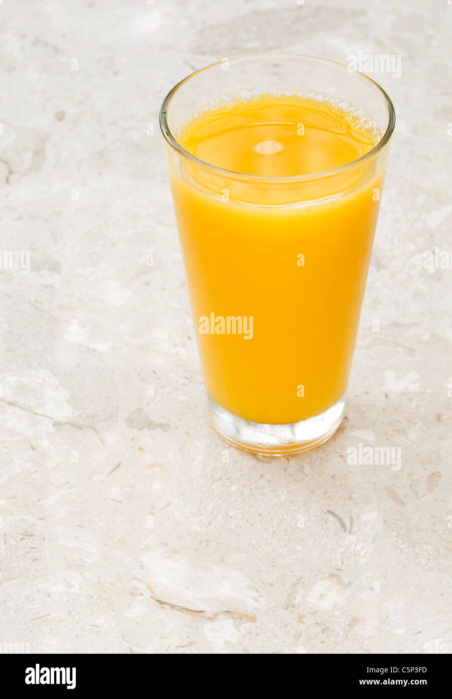 Glass of orange juice Stock Photo