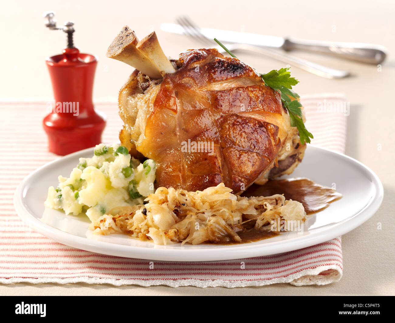 Grilled knuckle of pork with sauerkraut (Eisbein Stock Photo Alamy
