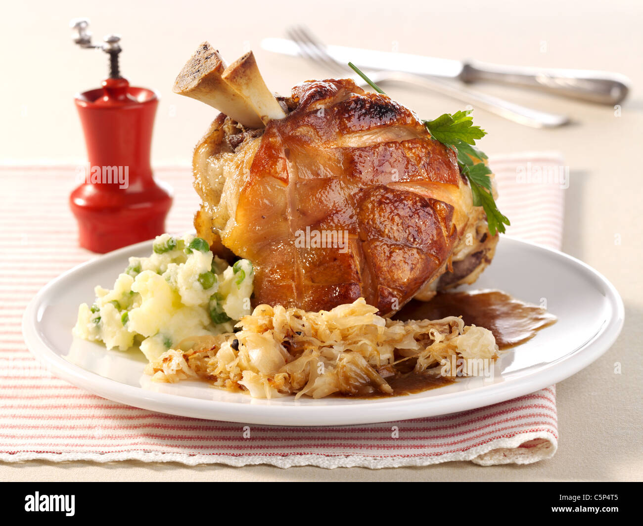 Grilled knuckle of pork with sauerkraut (Eisbein Stock Photo - Alamy