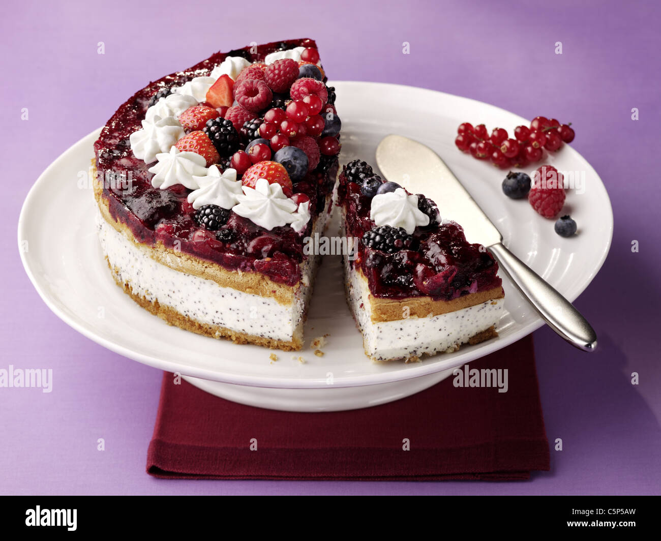 Red fruit jelly tart with poppy seed cream Stock Photo Alamy