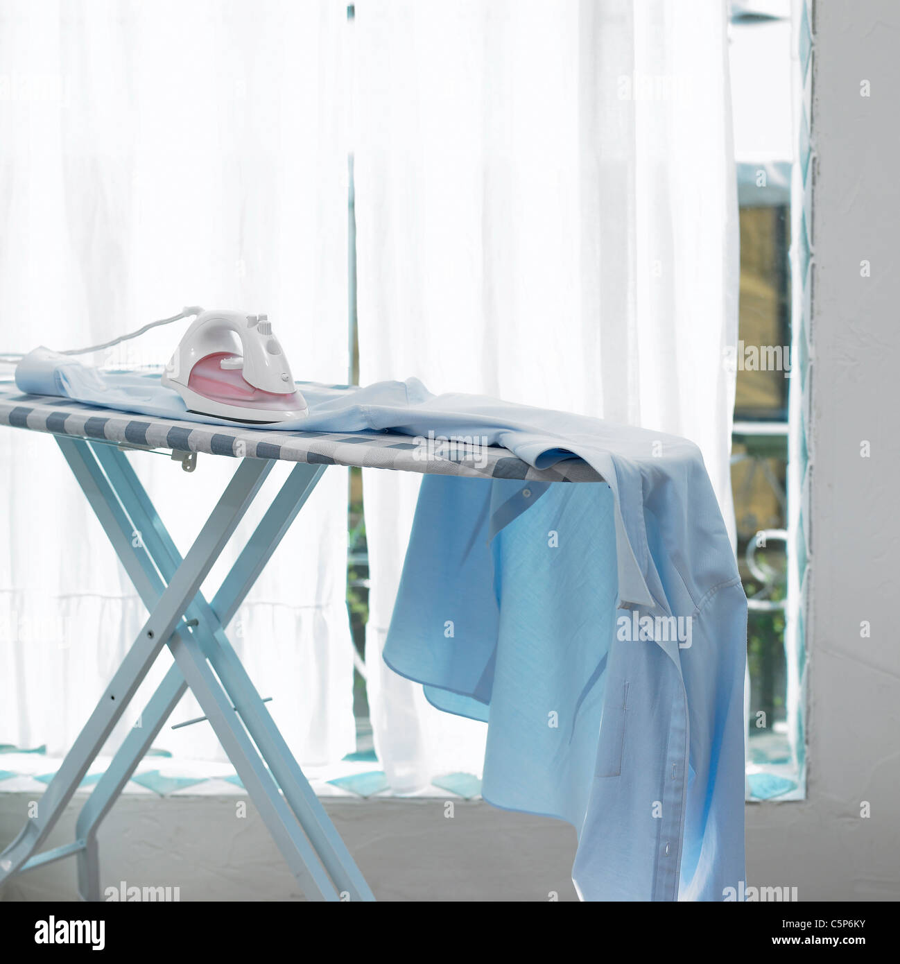 Ironing board and iron Stock Photo Alamy