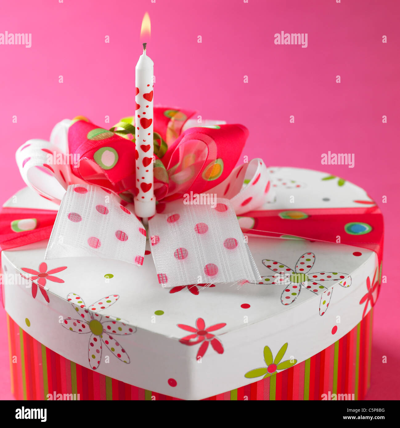 Present box and candle light Stock Photo Alamy
