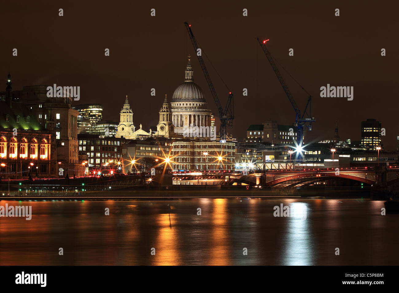 St Paul's Cathedral at night, view across the Thames, London, UK Stock Photo