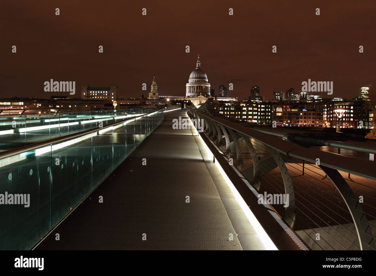 View from Millennium Bridge of St Paul's Cathedral at night, London, UK Stock Photo