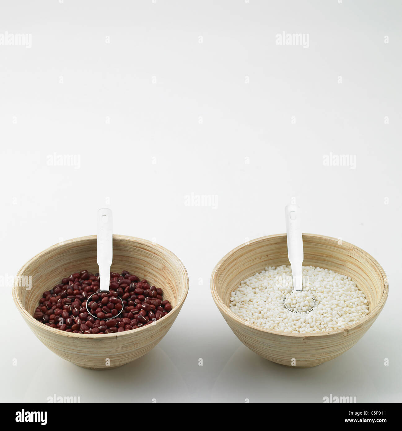 Beans and rice in bowls Stock Photo