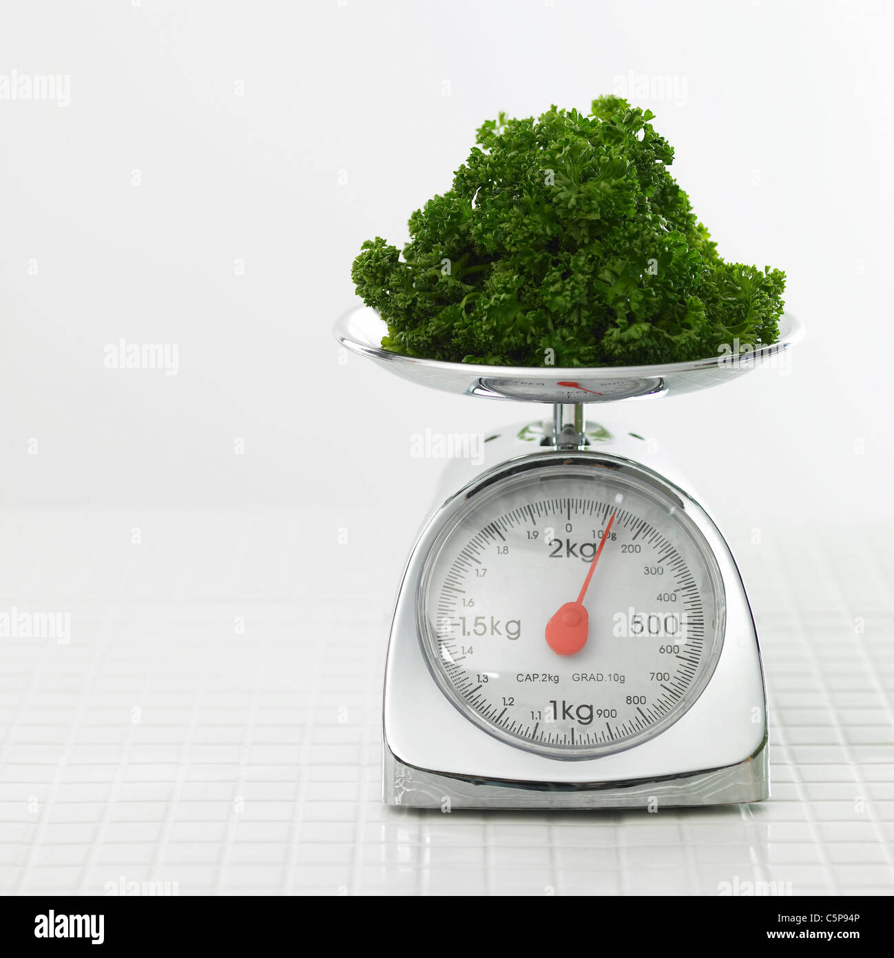 Broccoli on a scale Stock Photo