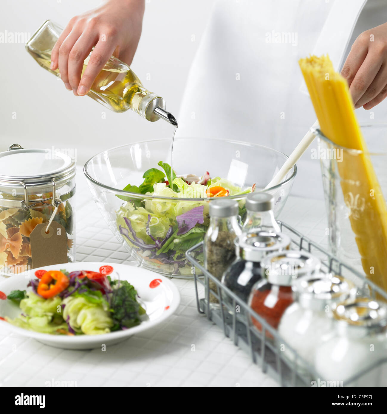 A person making salads Stock Photo