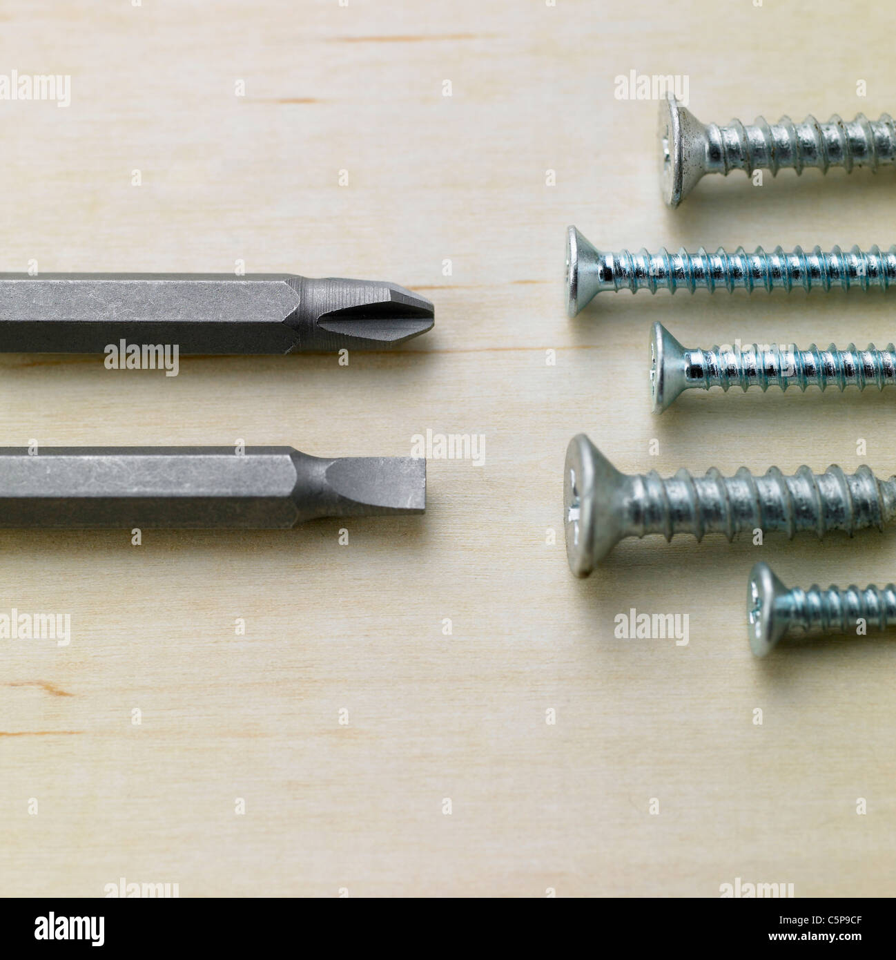 Screw drivers and screw nails Stock Photo