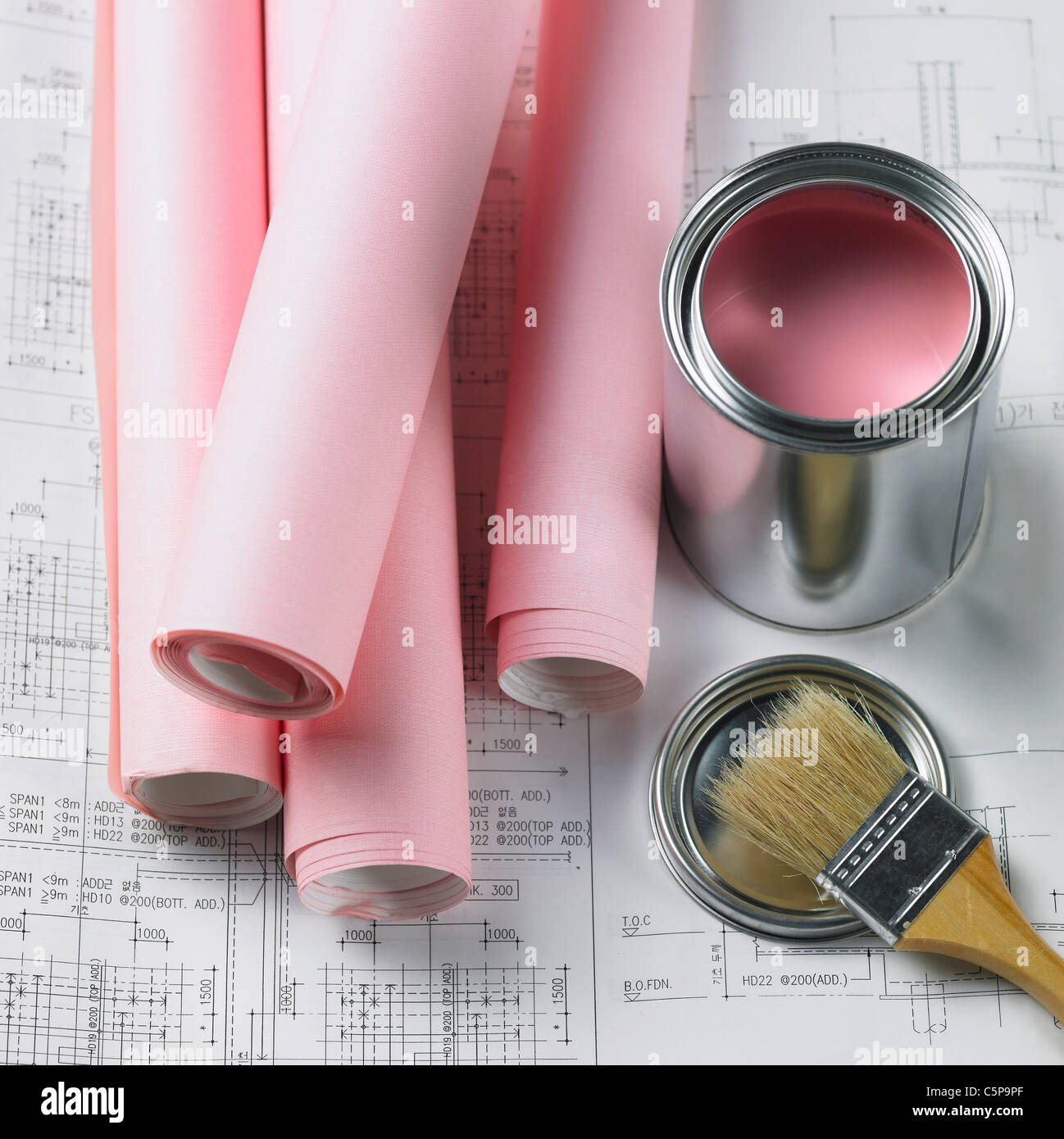 Paints, brushes and blueprint Stock Photo