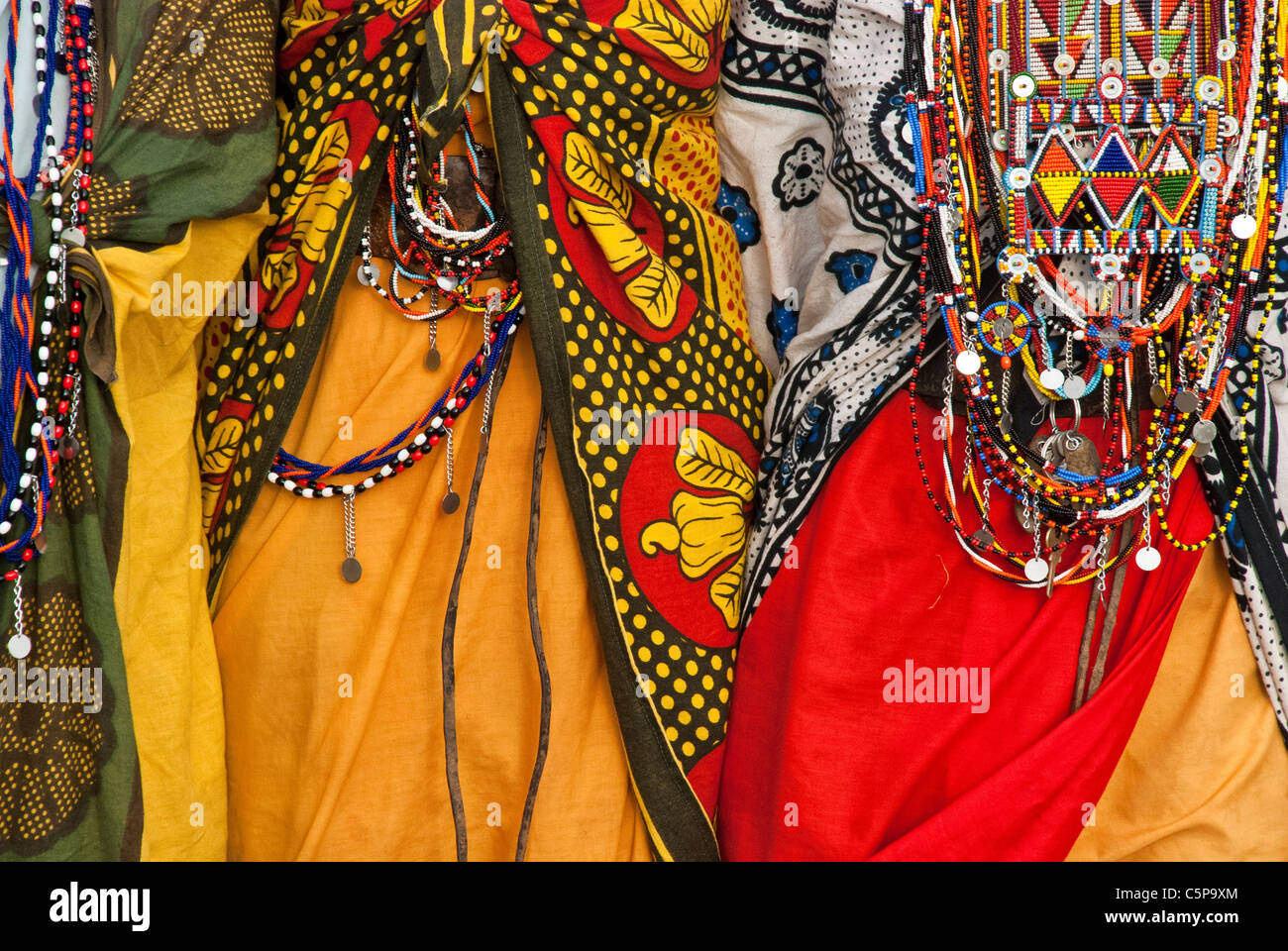 Close-up of Masai women wearing traditional dress, in a village near the Masai Mara, Kenya, Africa Stock Photo