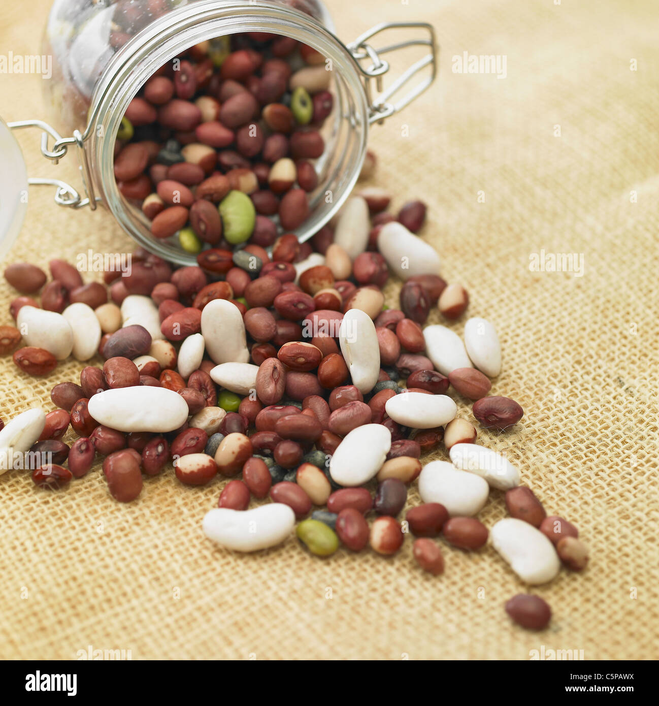 Beans spilled from a bottle Stock Photo Alamy