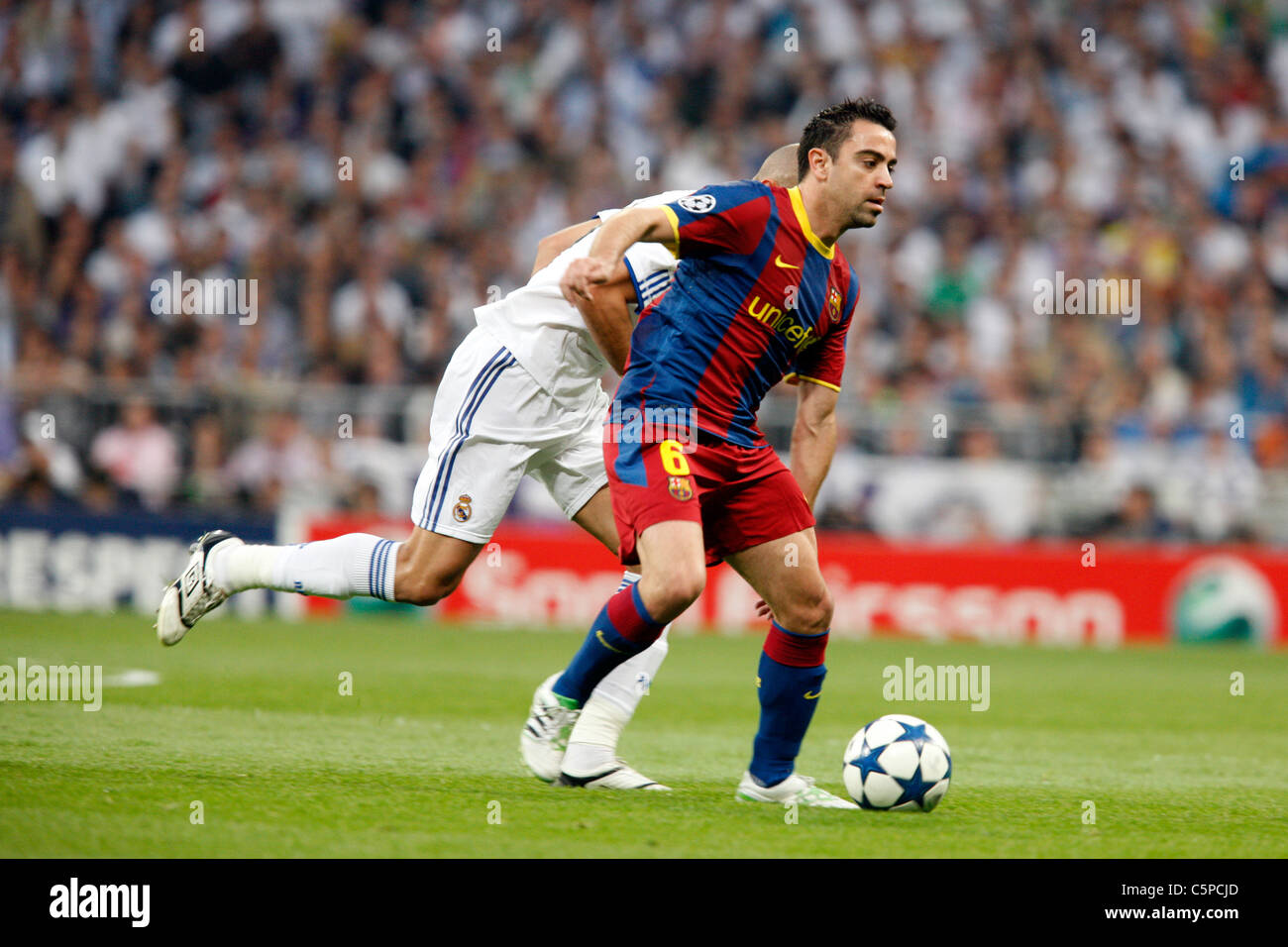 Xavi with the ball, UEFA Champions League Semifinals game between Real  Madrid and FC Barcelona, Bernabeu Stadiumn, Madrid, Spain Stock Photo -  Alamy