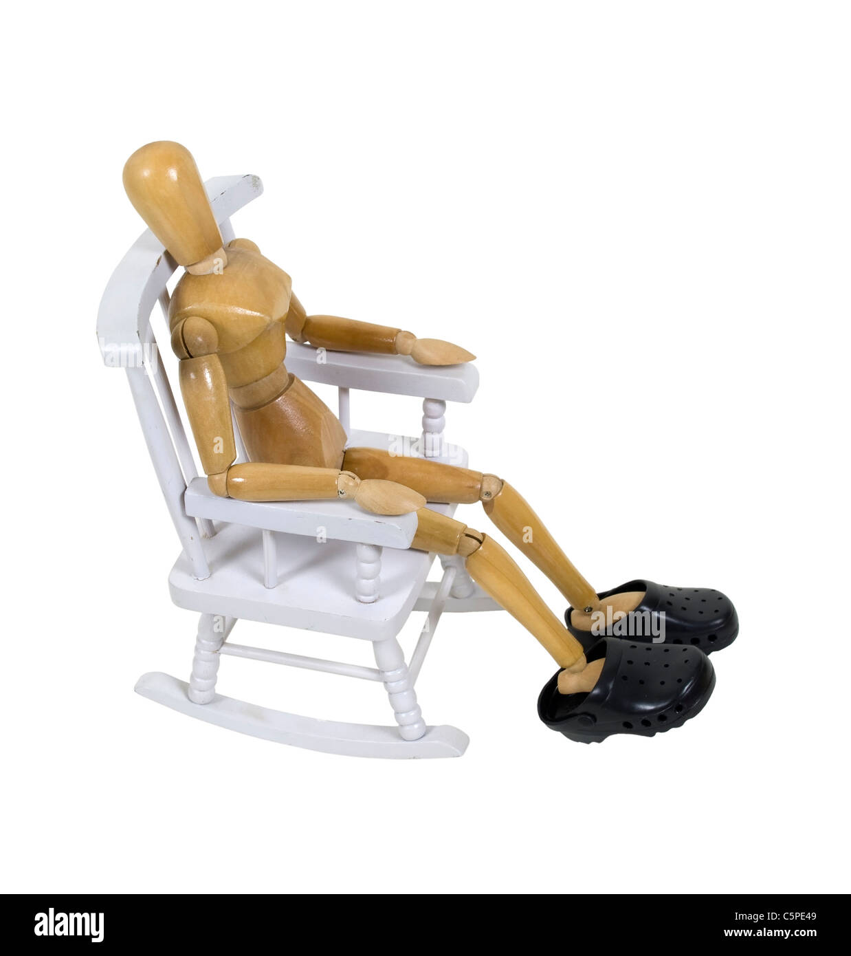 Sitting in a rocking chair and wearing black rubber clogs path