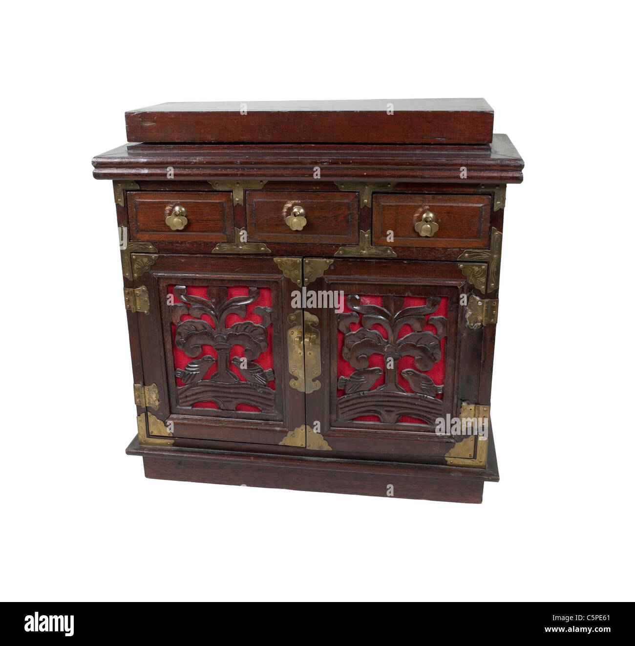 An old antique wooden and brass chest with small drawers for storing ...