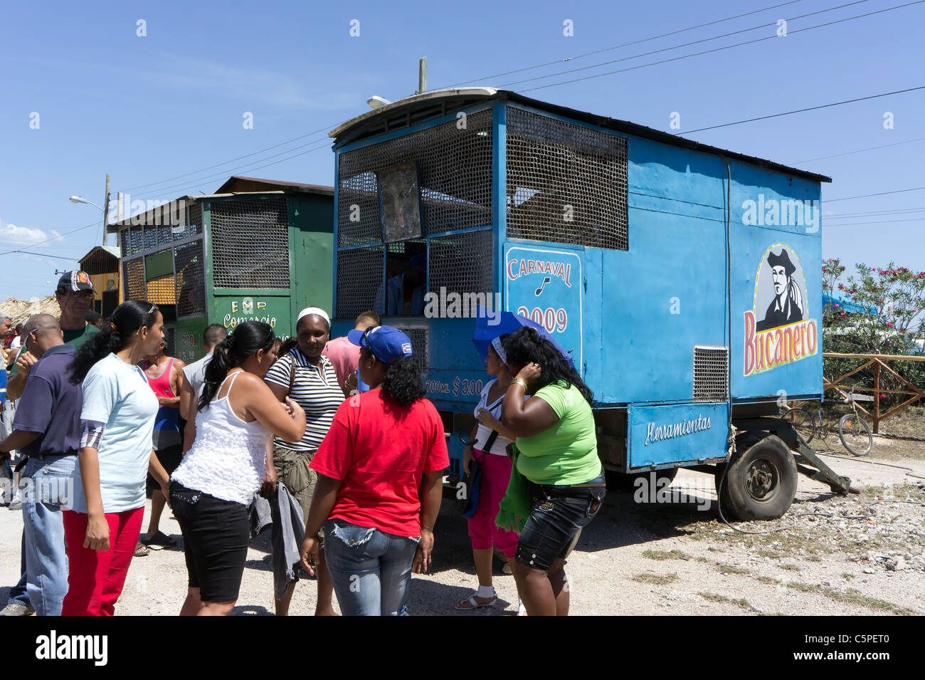 Cubans dancing salsa near a beer truck during all day fiesta to celebrate 50th anniversary of Bay of Pigs victory, Playa Giron Stock Photo