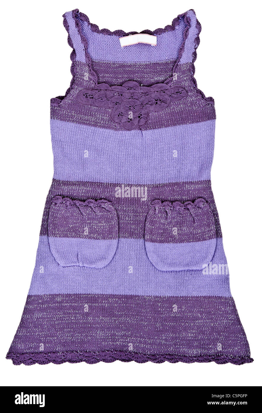 purple knitted baby dress with pockets on a white background Stock