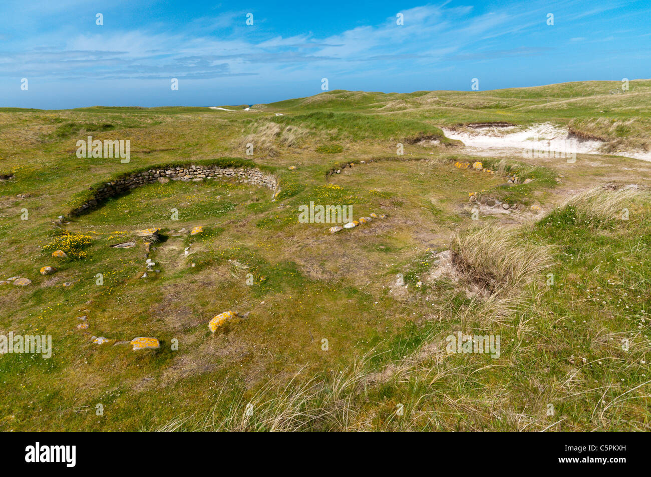 Cladh Hallan roundhouses on the island of South Uist in the Outer Hebrides. Stock Photo