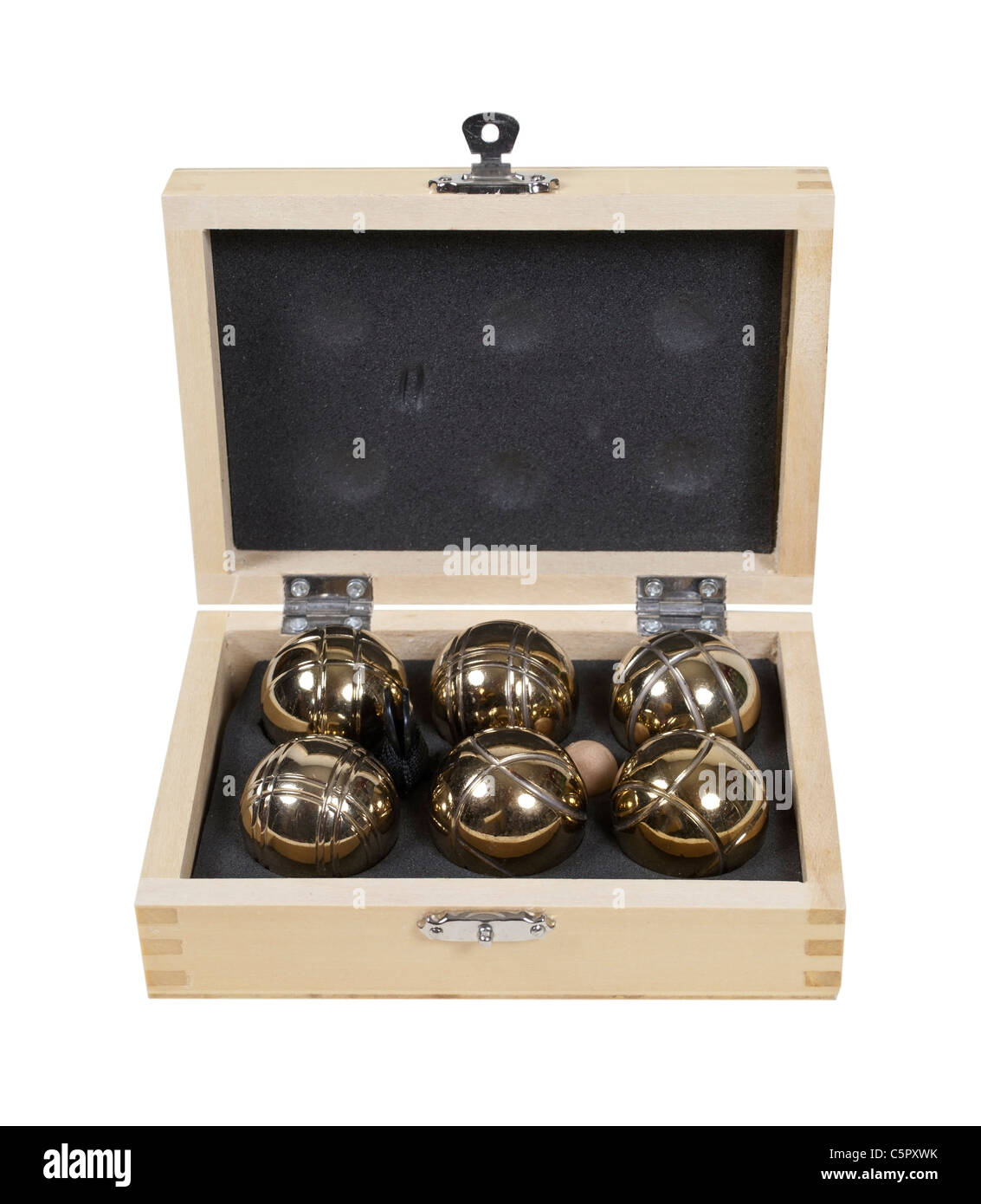 A set of brass bocce balls in a wooden case path included Stock Photo