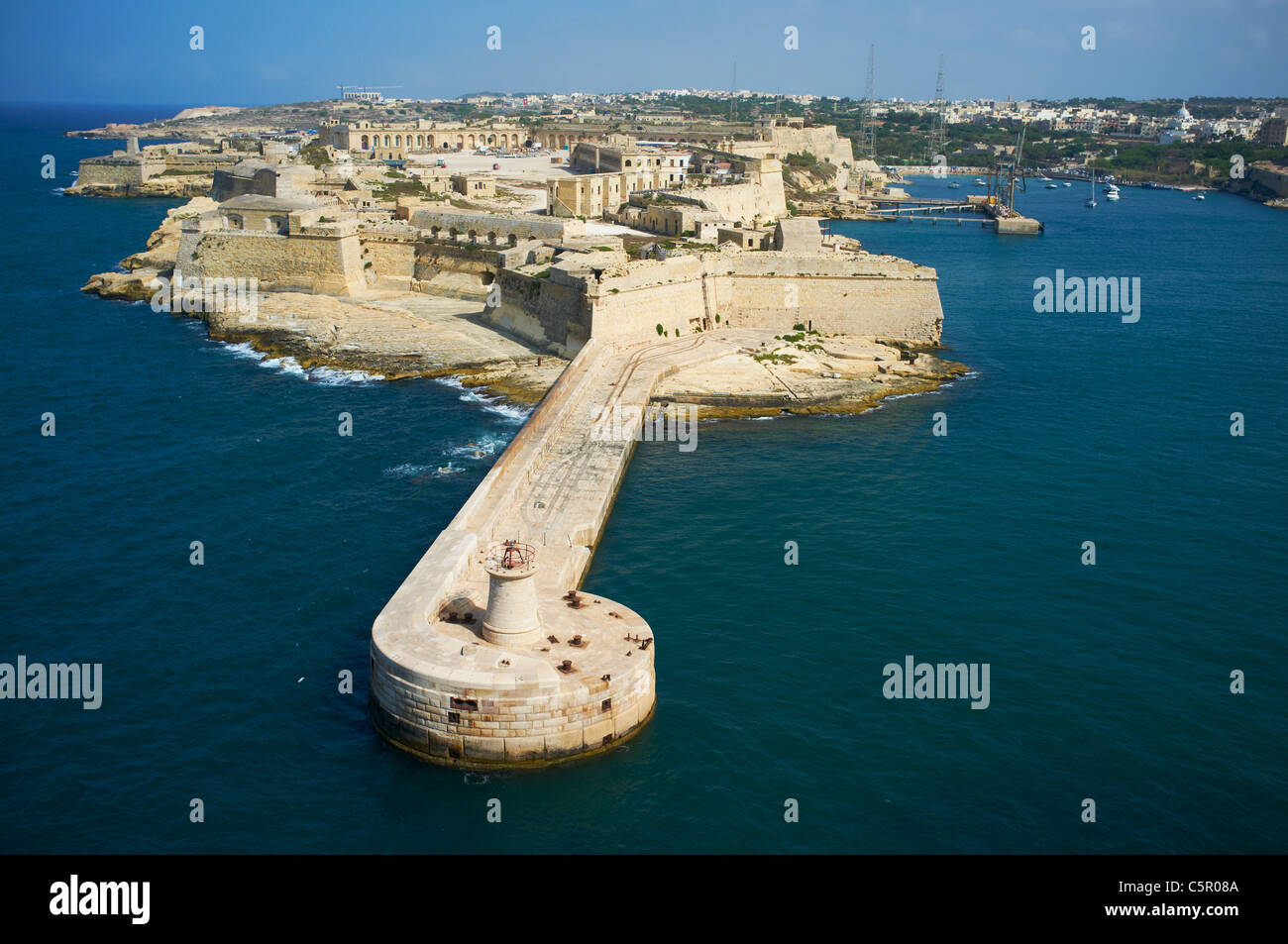 Entrance to the Harbour and view towards Fort Ricasoli Valletta Malta Stock Photo